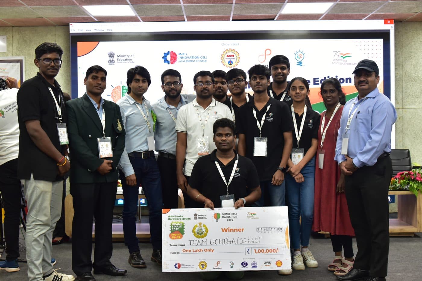 The winning team standing together with the winners' cheque at Smart India Hackathon.